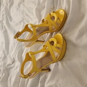 Never worn BCBGeneration yellow heels